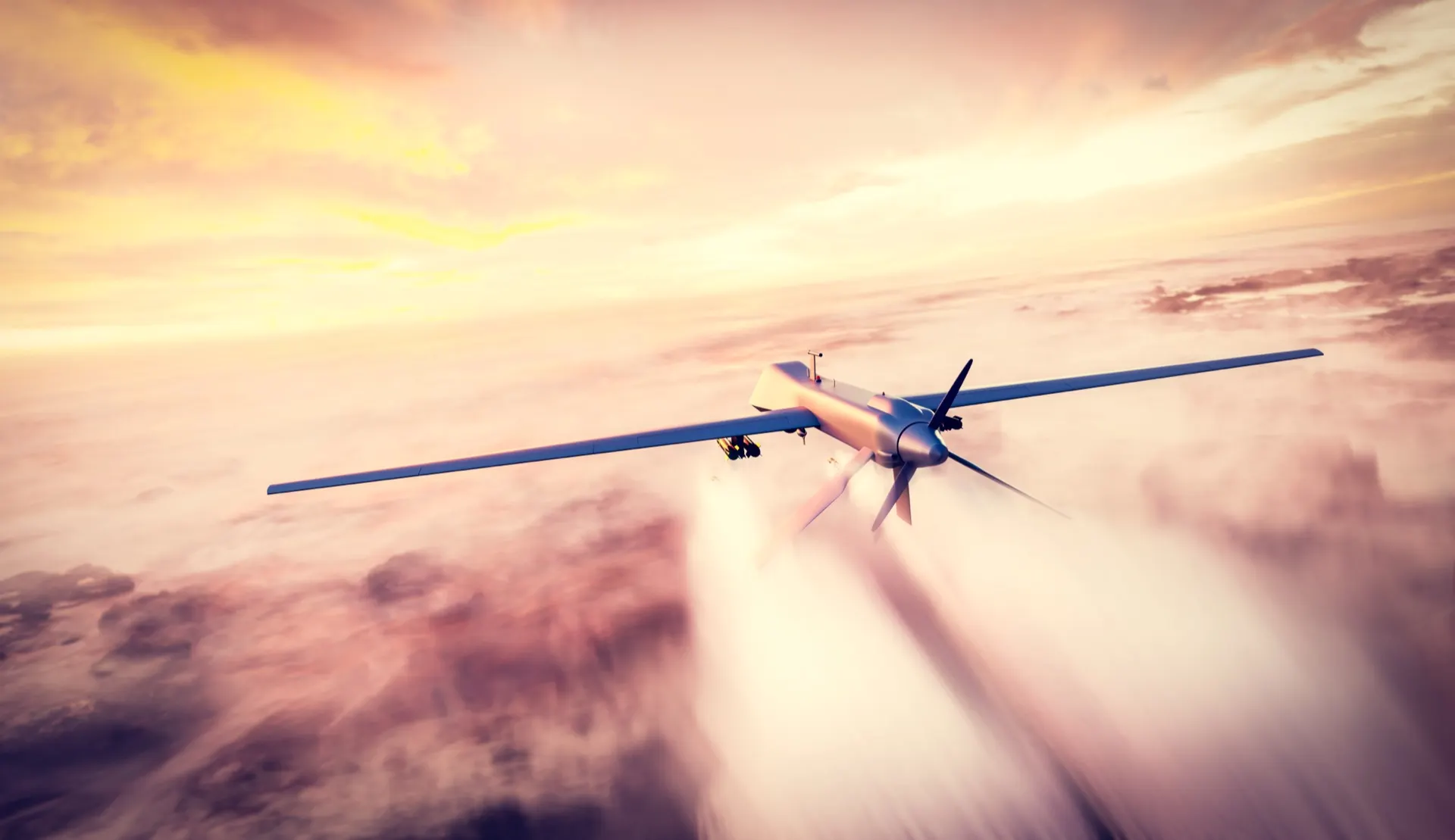 Military drone in flight, representing aerospace cable assembly applications